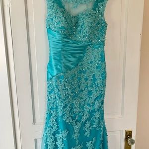 Size 12 formal gown. Brand new. Only worn to try on twice